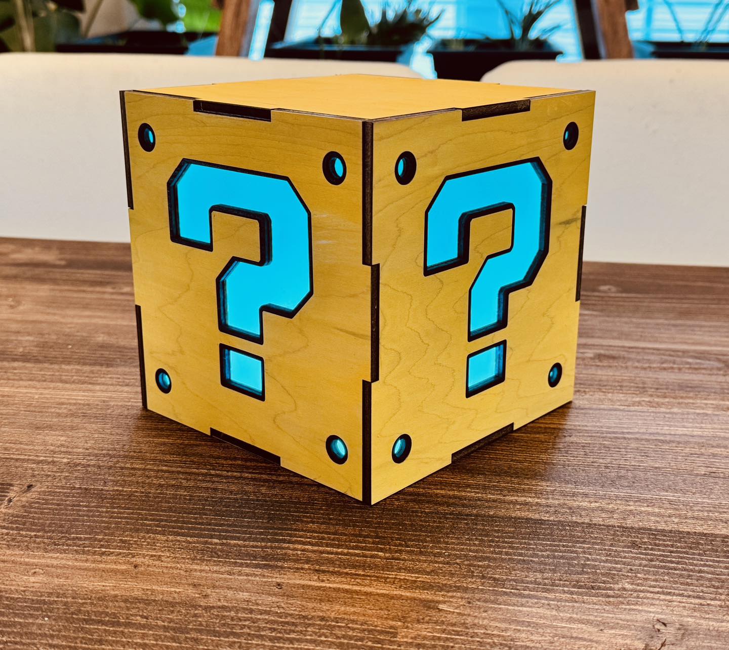 a wooden block with question mark on it