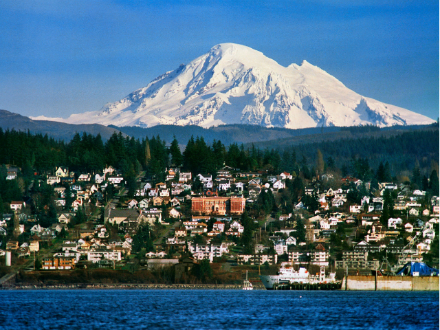Scenic view of Bellingham, Washington with Mount Baker towering over the city and harbor.