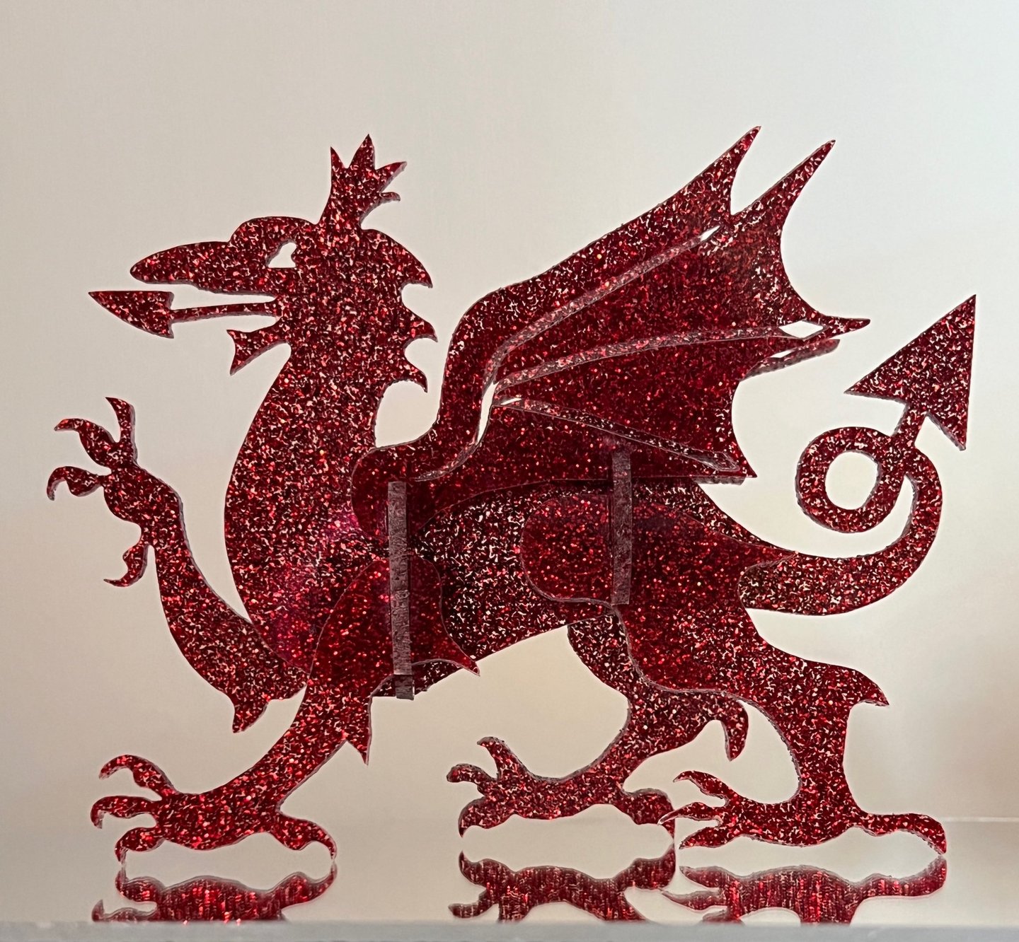 An image of a glittery red dragon