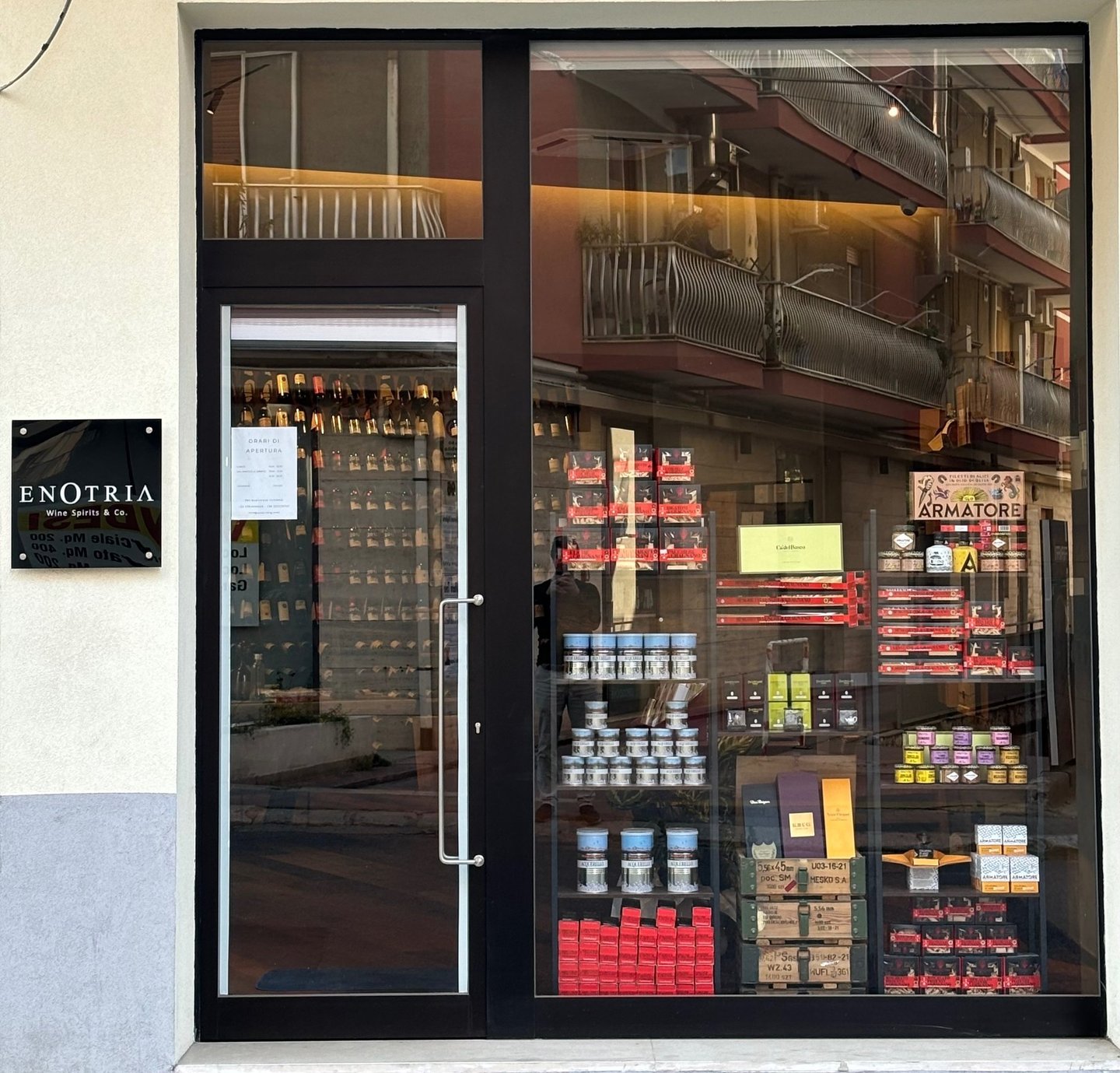 a store front door with a sign that says lolli