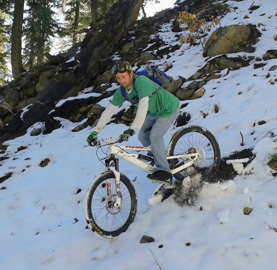 mountain biker riding in snow