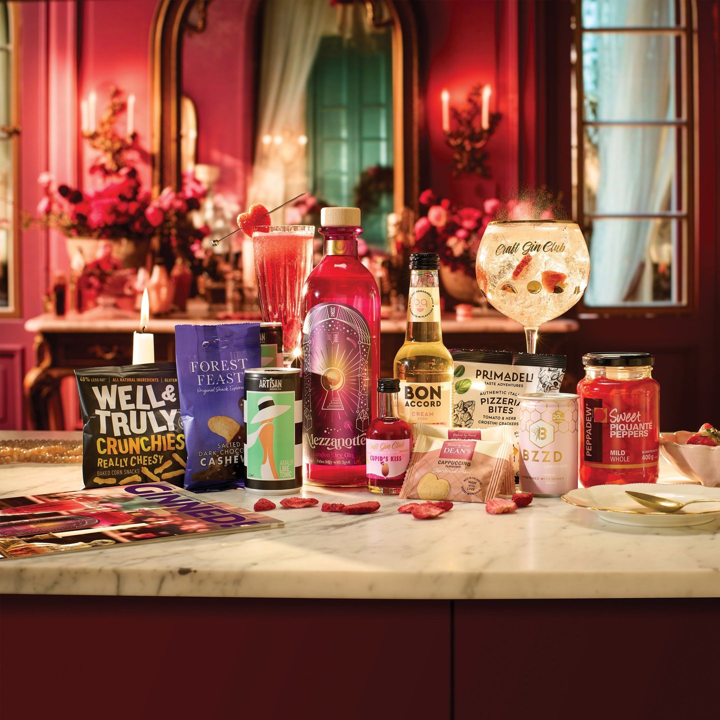 foto di tanti prodotti da mangiare disposti su un tavolo con petali di rosa e sfondo rosa elegante