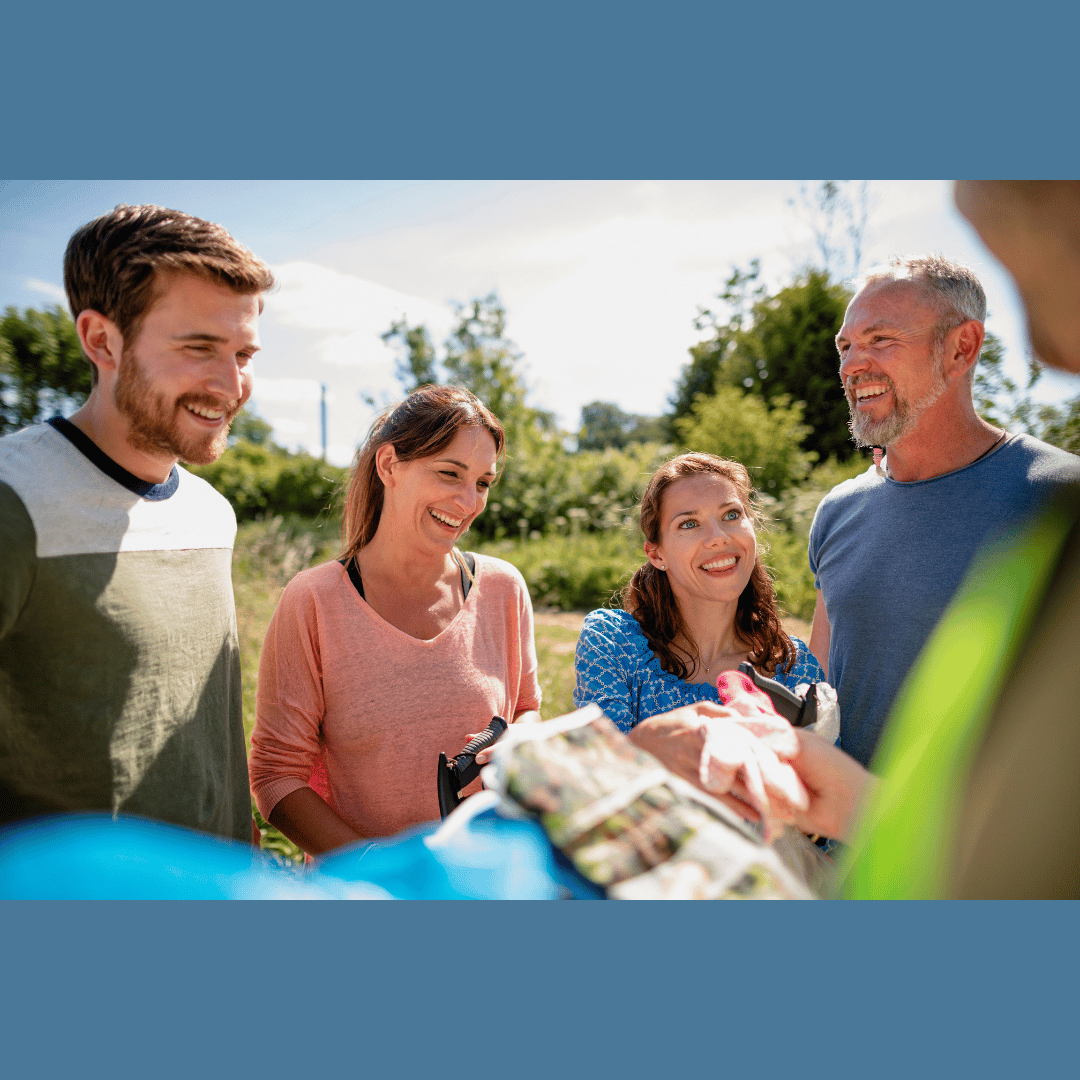 a group of people getting ready for a community clean up