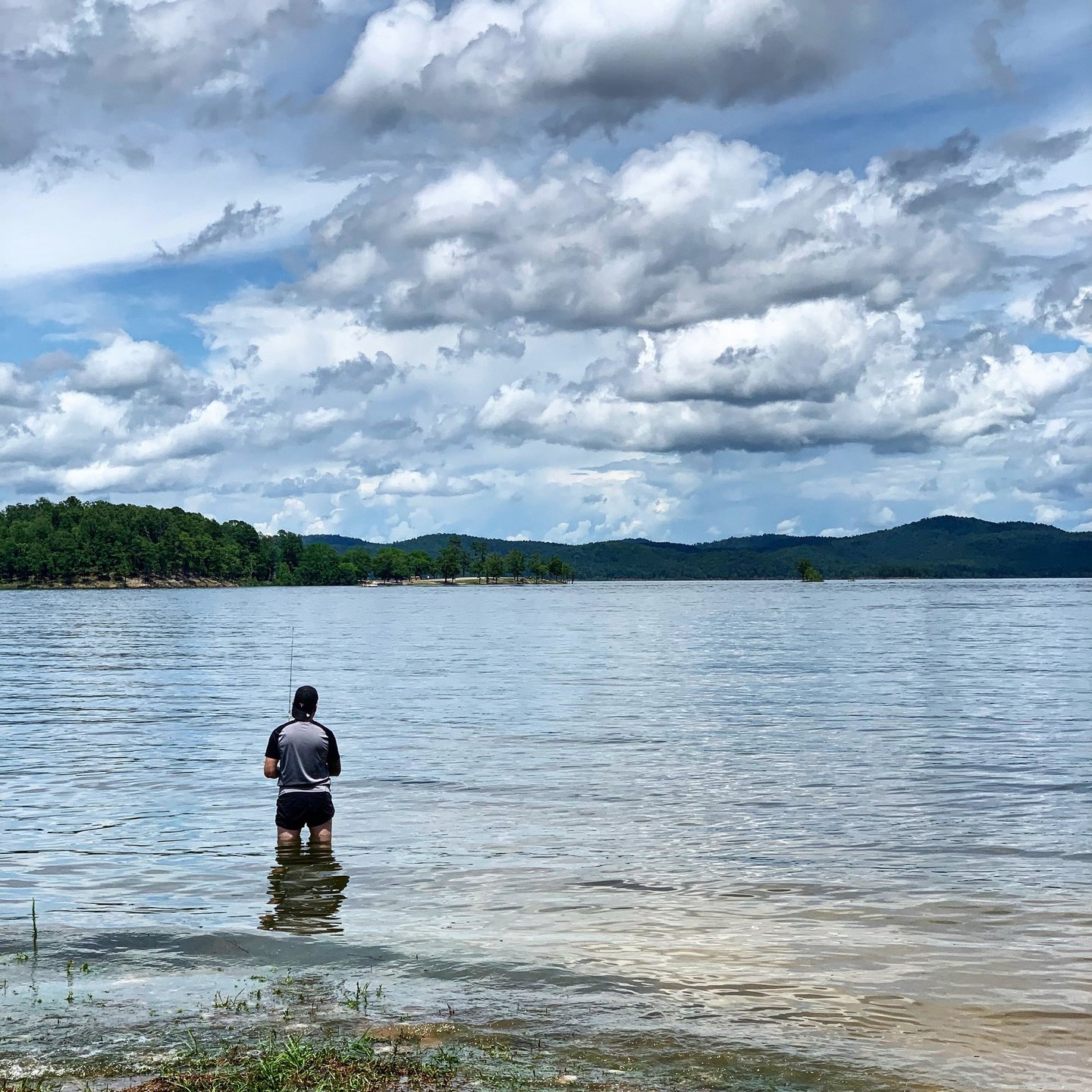 Founder fishing in a lake