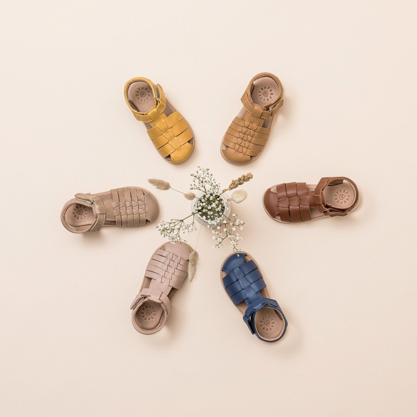 Product photography - a group of baby's shoes