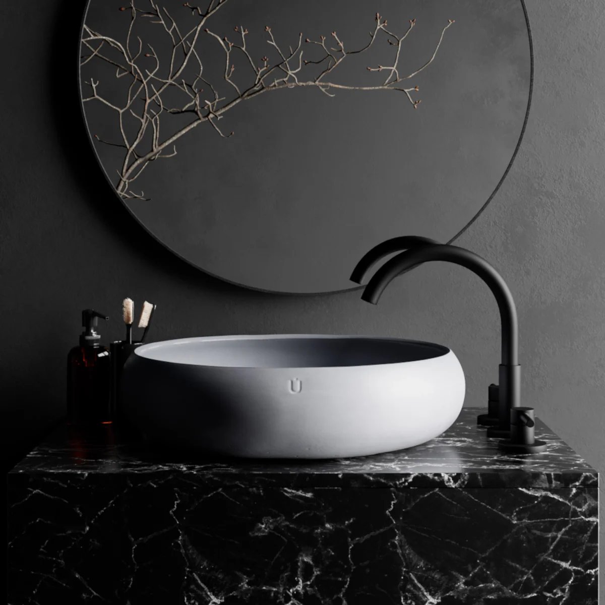 Cuba branca de design minimalista sobre bancada de pedra escura com torneira preta em banheiro