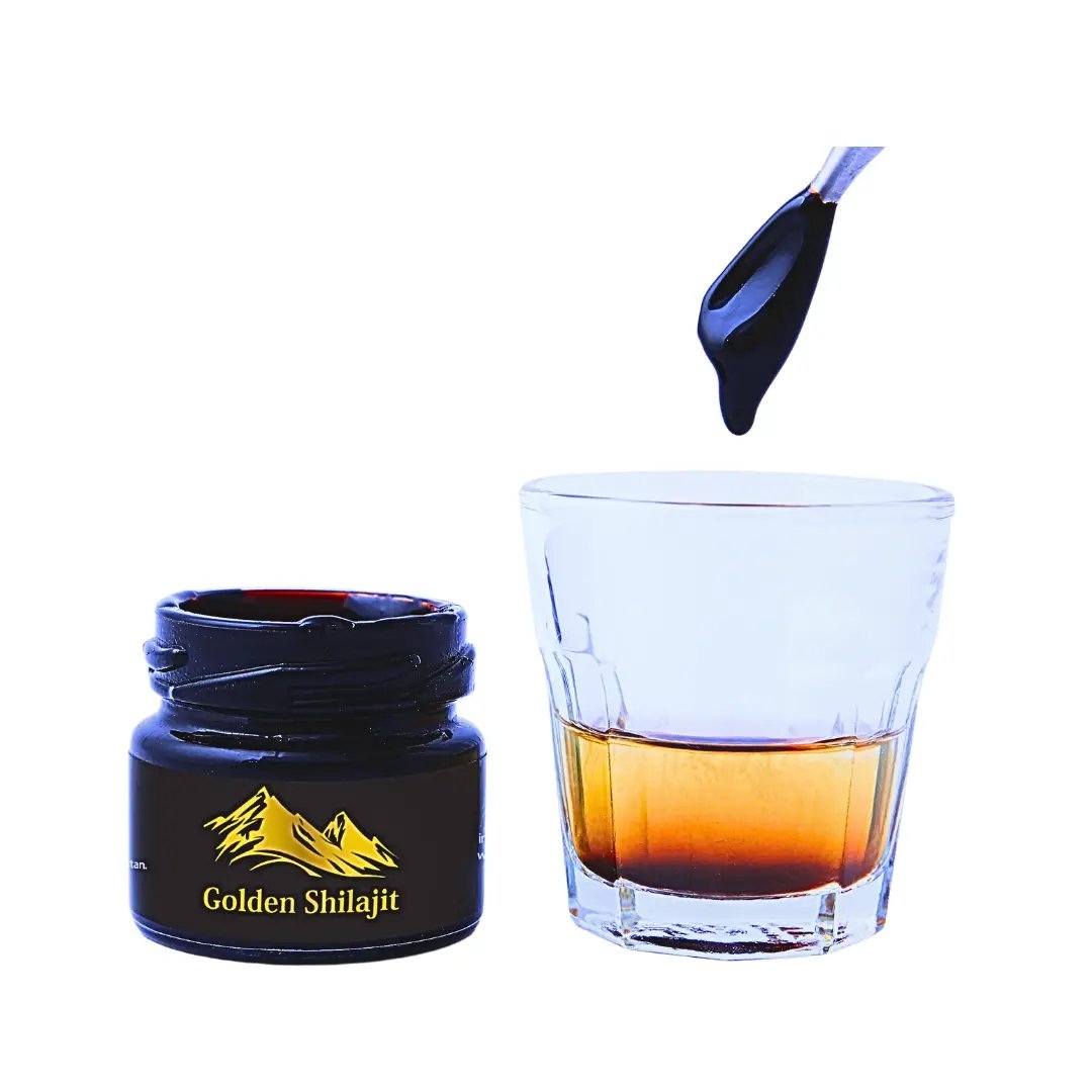 a spoon of golden shilajit resin 