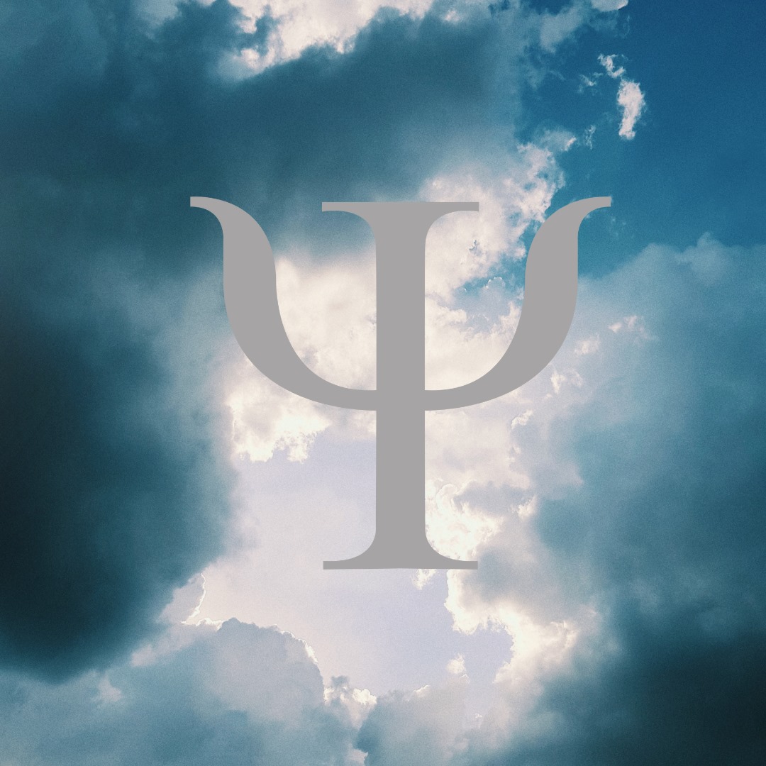 a large white letter p on a cloudy day