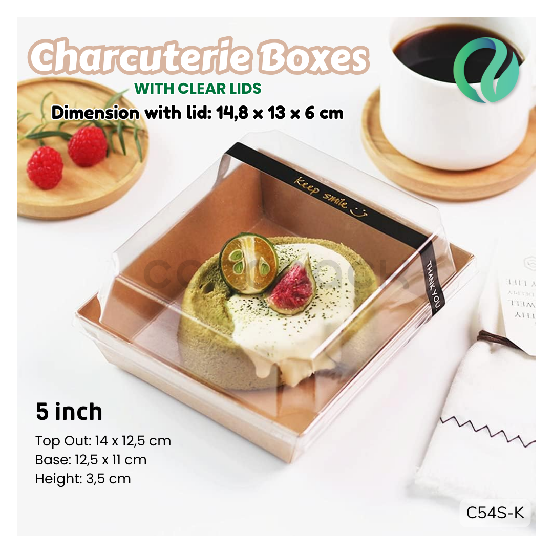 Disposable 5 inch charcuterie box with clear lid containing a gourmet dessert and fruit.