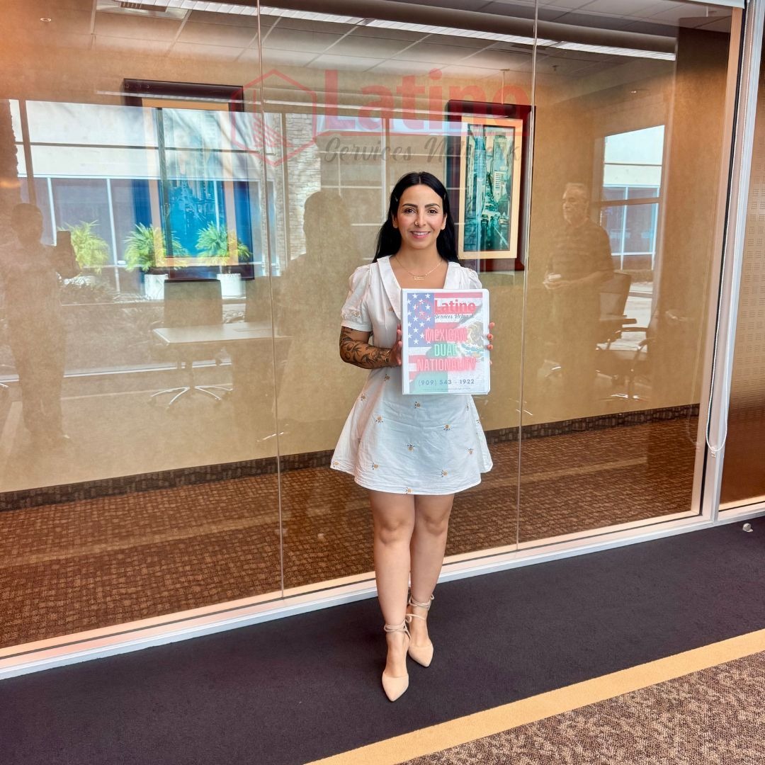 woman holding Mexican Birth Certificate obtained using Latino Services Network