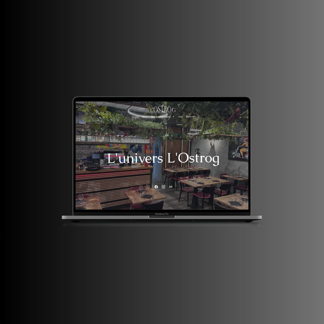 A Macbook Pro laptop displaying the L'Ostrog restaurant website design with a rustic interior view.