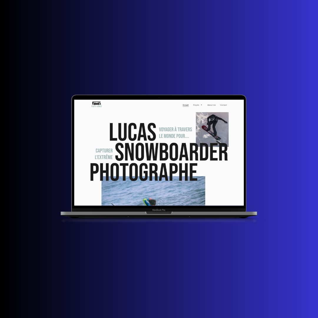 A MacBook Pro displaying a photography portfolio website for a professional snowboarder photographer.