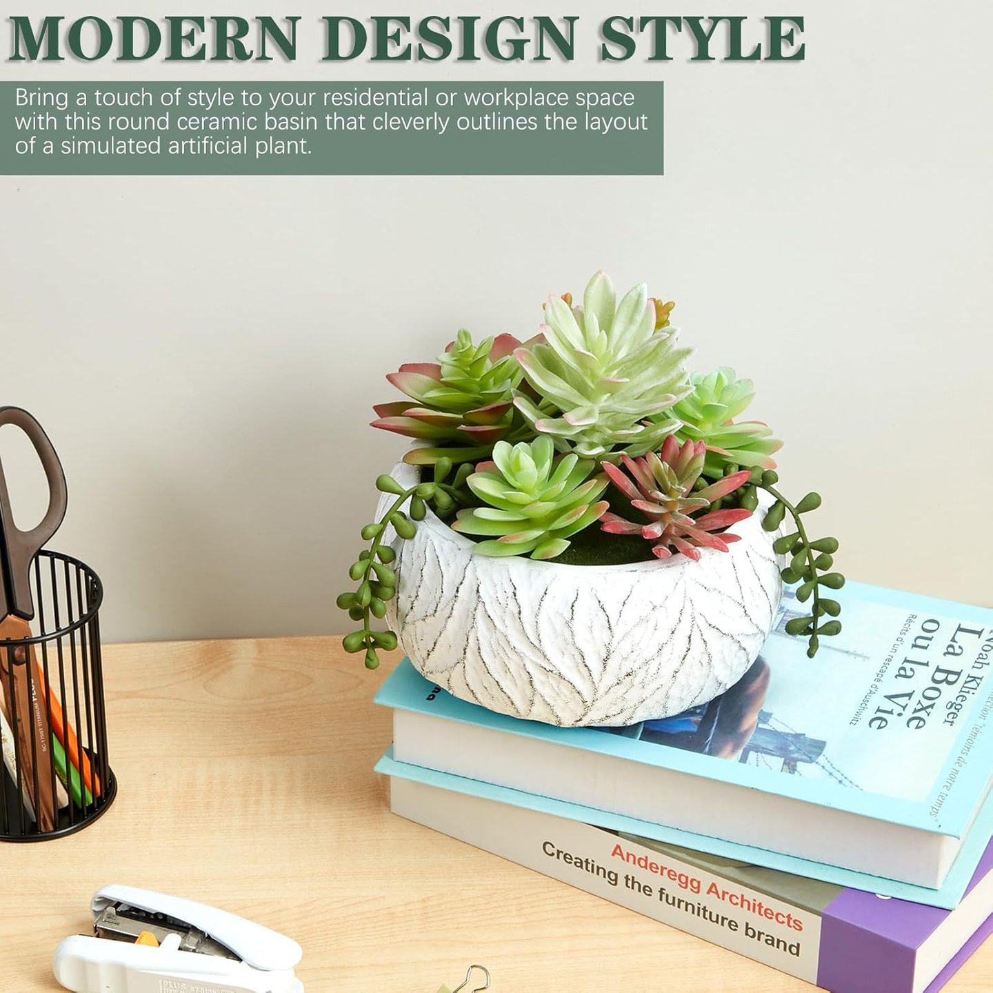 Stylish round ceramic basin with artificial succulents, ideal for modern office or home decor.