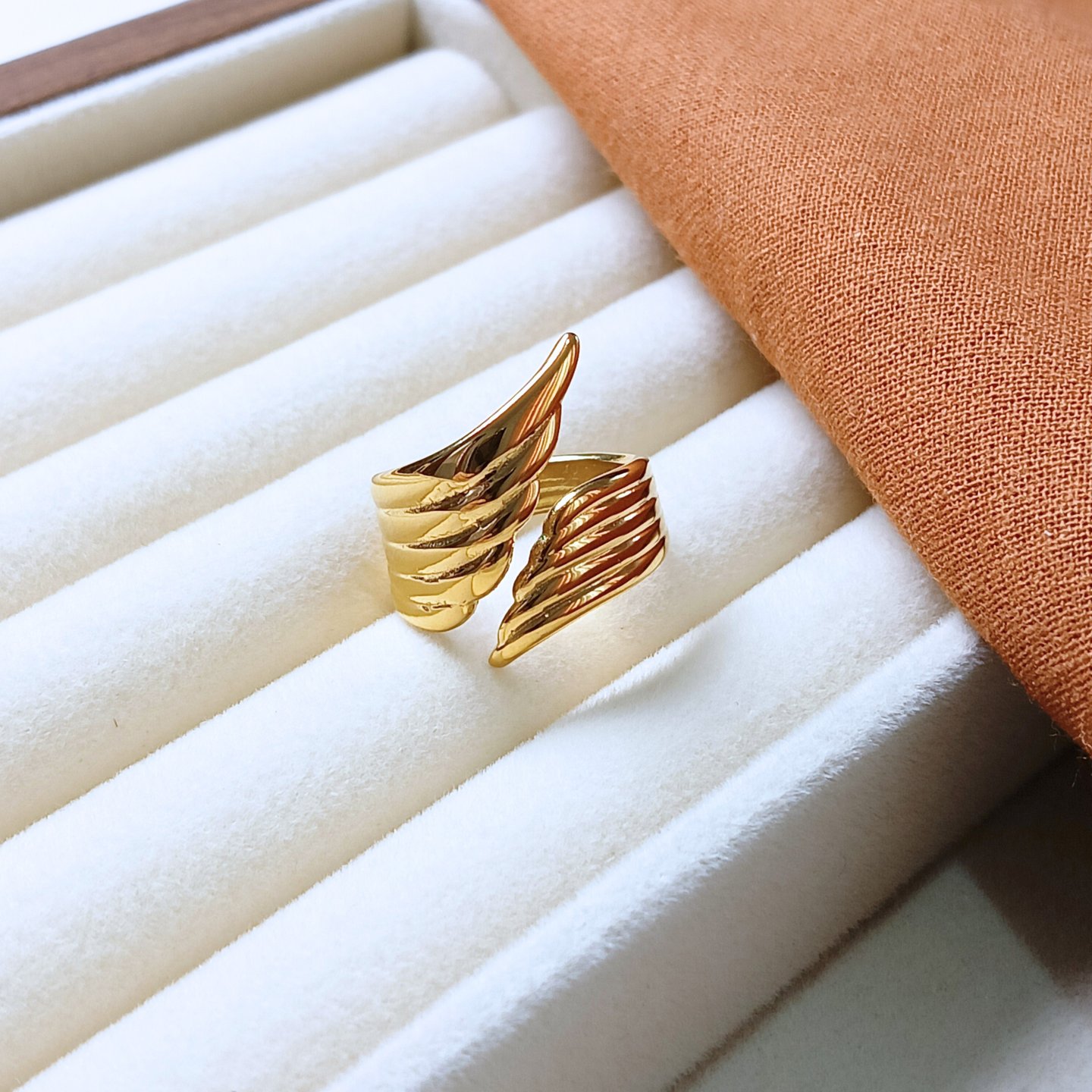 gold-plated angel wings ring