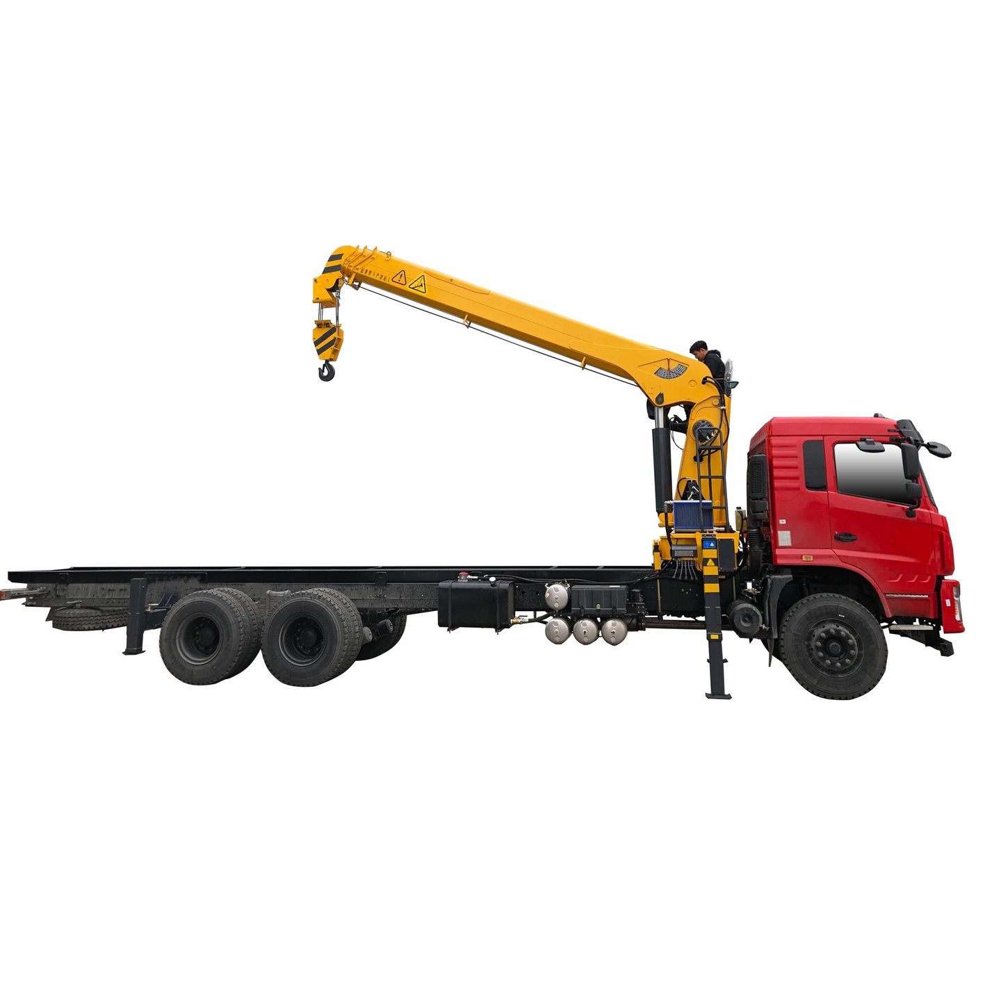 A red cab crane truck with a telescopic loader crane.