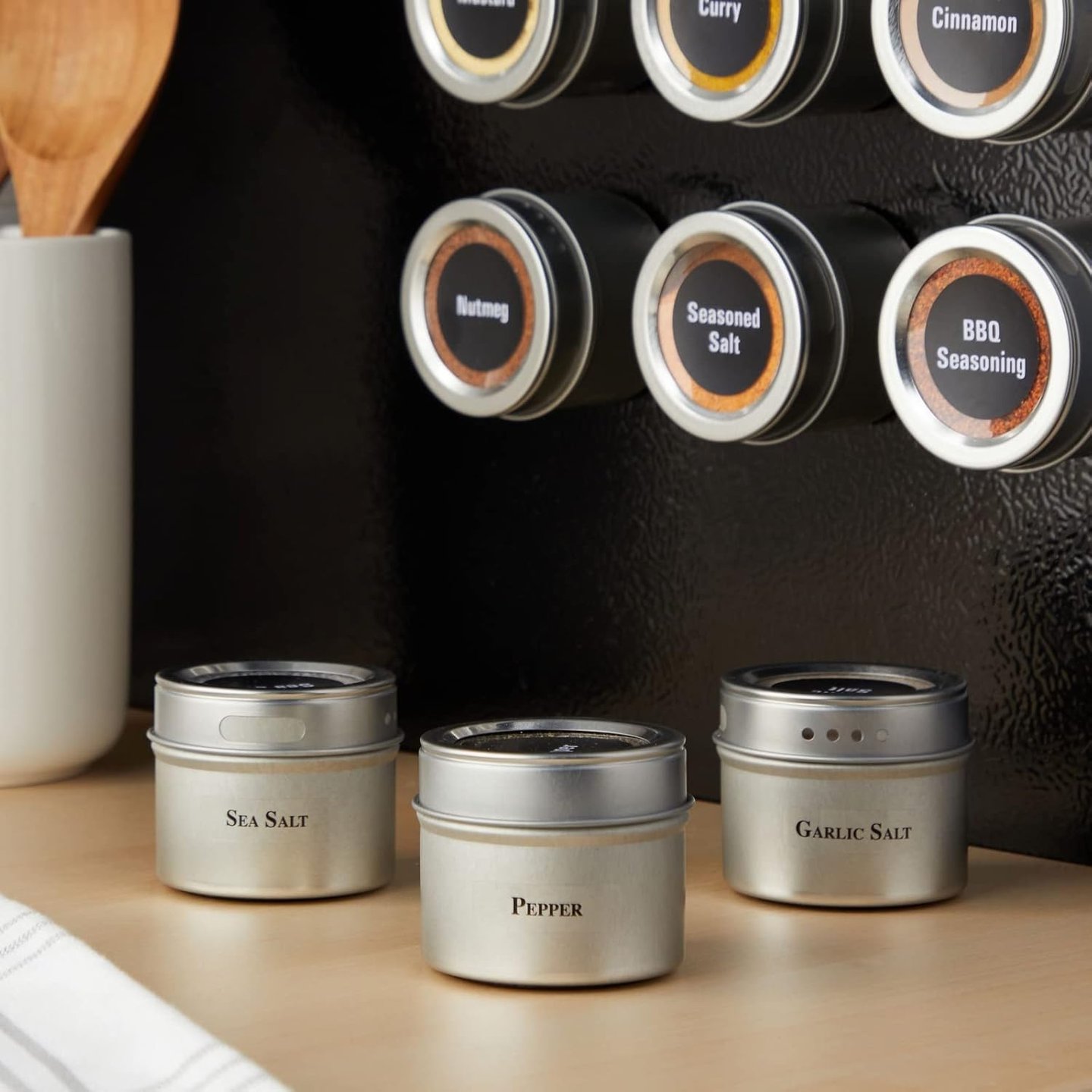 magnetic spice jars on refrigerator for small kitchen organization