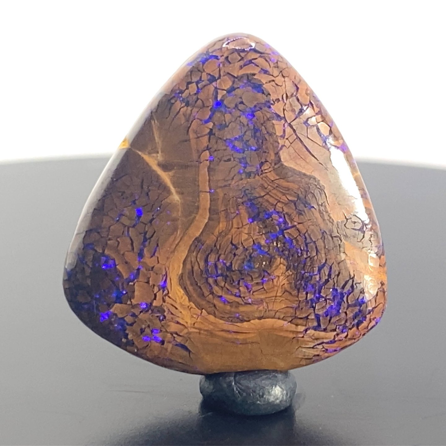 Purple flashes amongst Ironstone. Unique Queensland Boulder Opal from Australia.