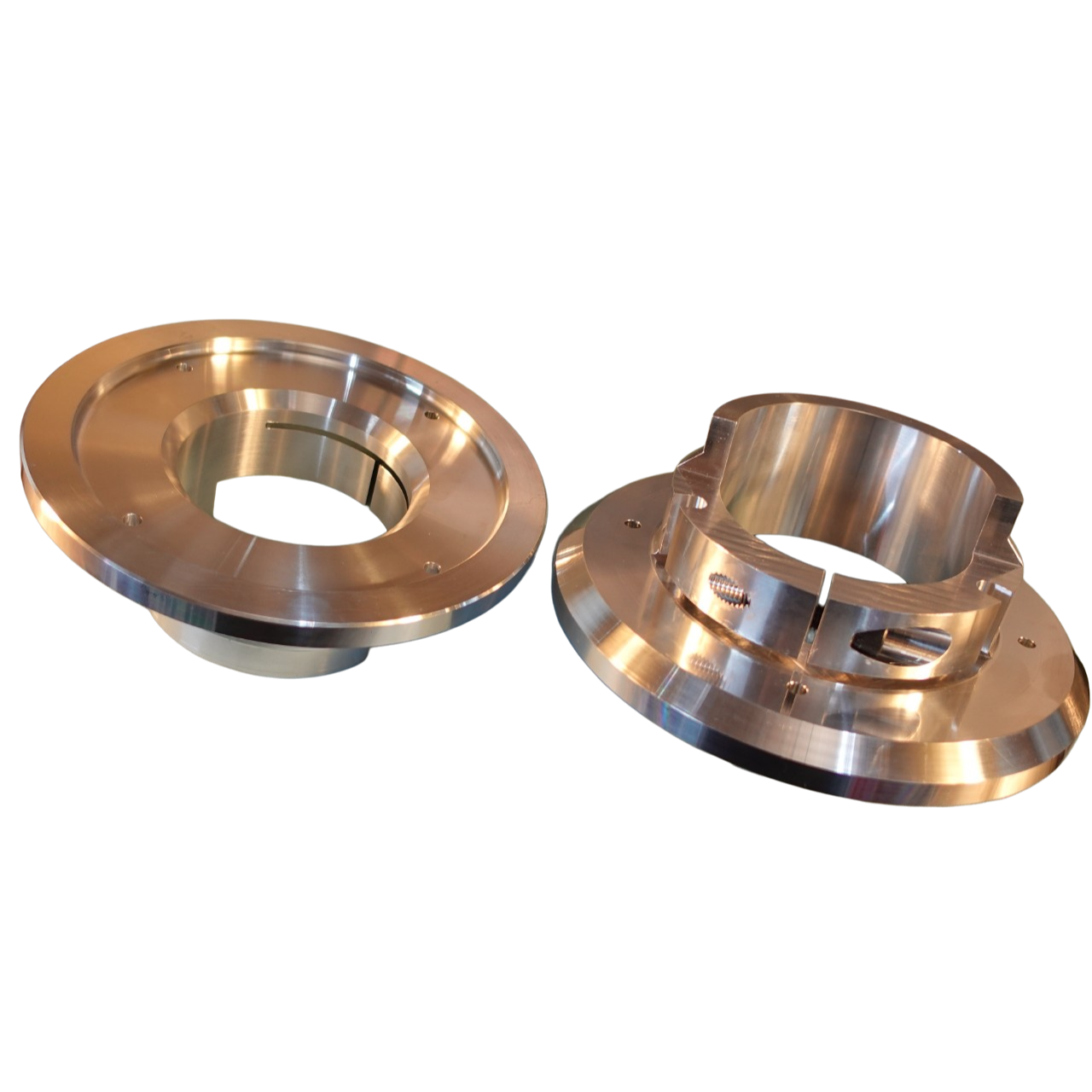 Pair of precision-machined aluminum industrial couplings for mechanical engineering.