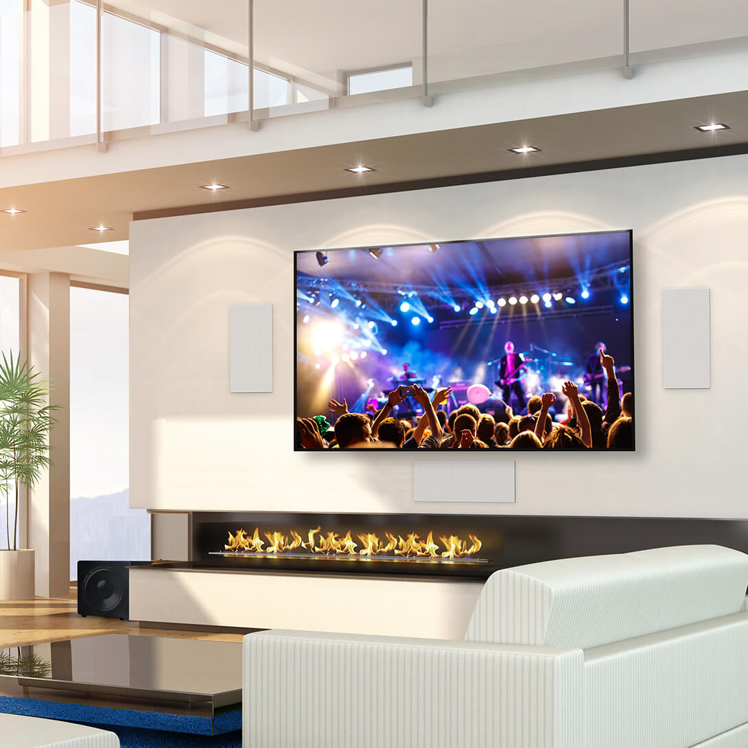 TV mounted on a wall with Home Cinema speakers in Milton Keynes. MountMyTV