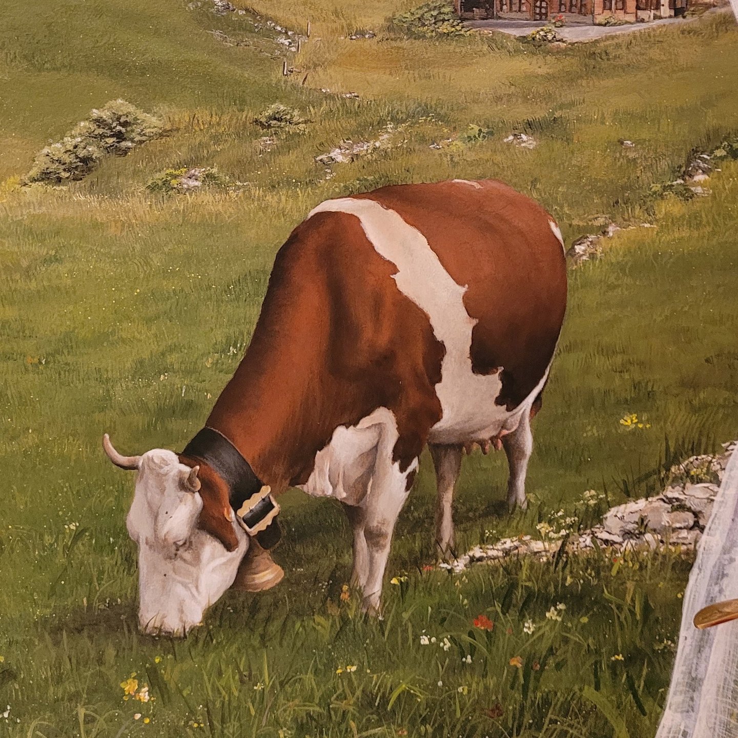Détail d'une peinture décorative: une vache Montbéliarde dans un champ fleuri. Lajoux, Jura, 39
