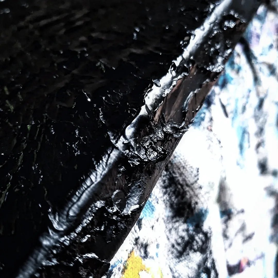 a close up of a black and white umbrella