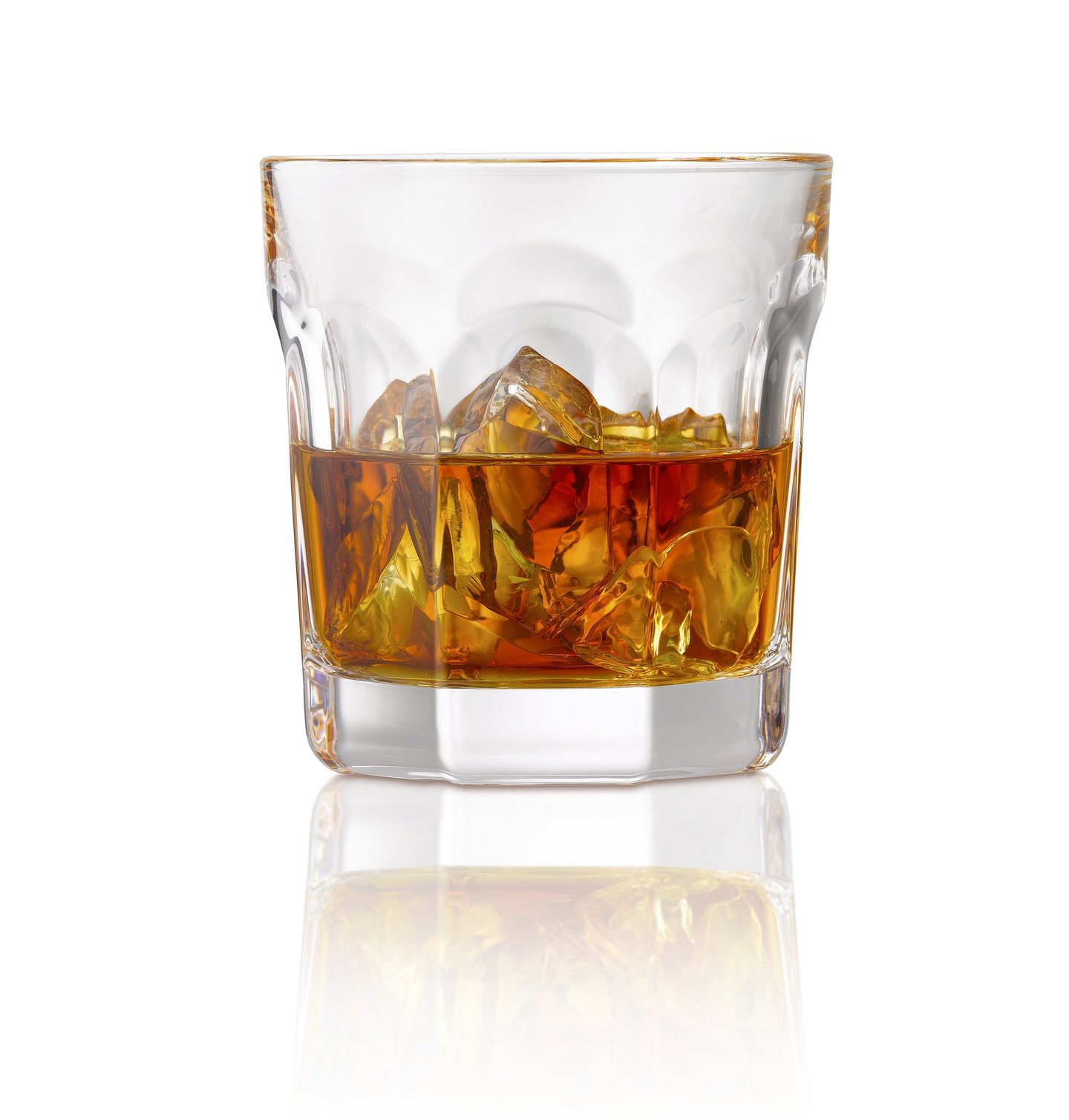 glass of whiskey on a white reflective background