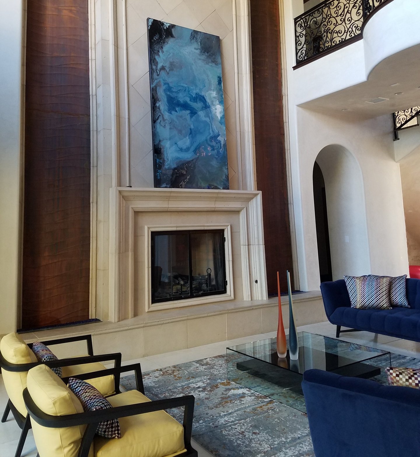 Art - Infinate Waters by Joline Renn and 8x4  resin piece -walls are venetian plaster in off white