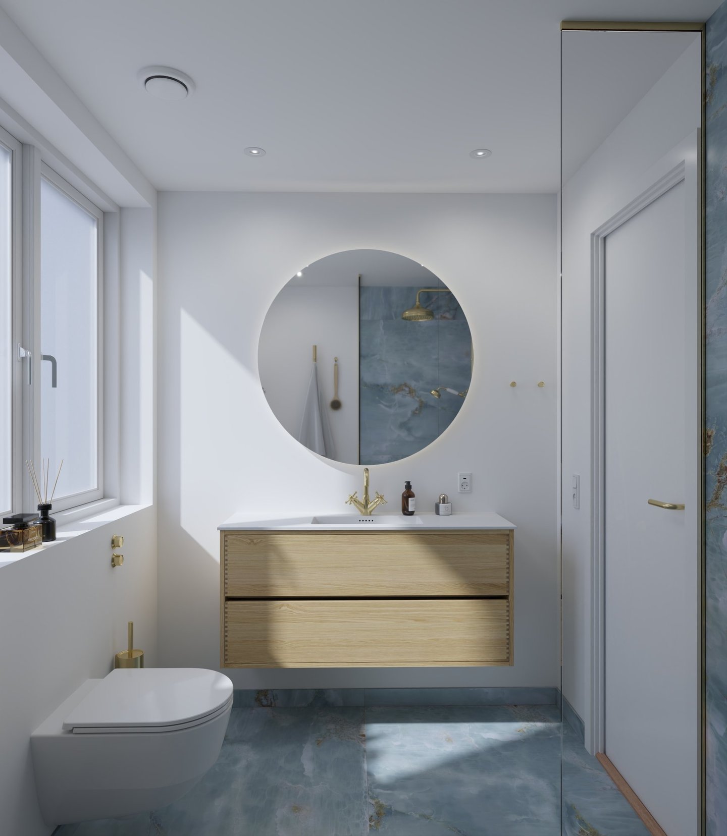 Modern bathroom with a light wood floating vanity, round backlit mirror, and gold fixtures.