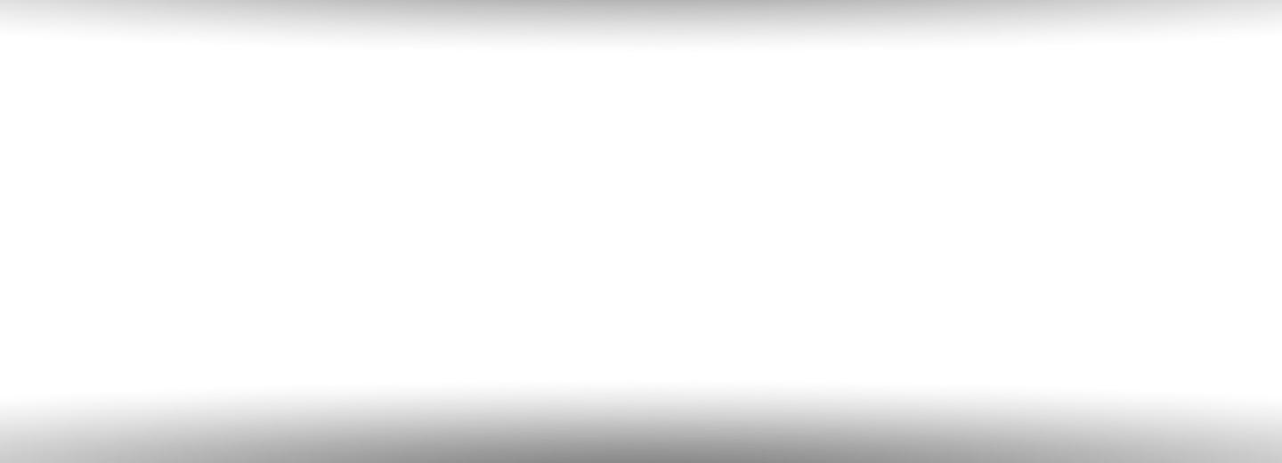 A blooming pink rose bud covered in fresh morning dew drops against a dark background.