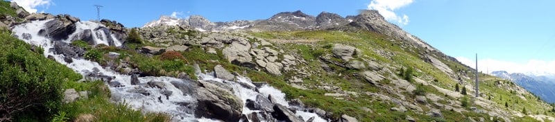 a mountain stream of water flowing down a mountain