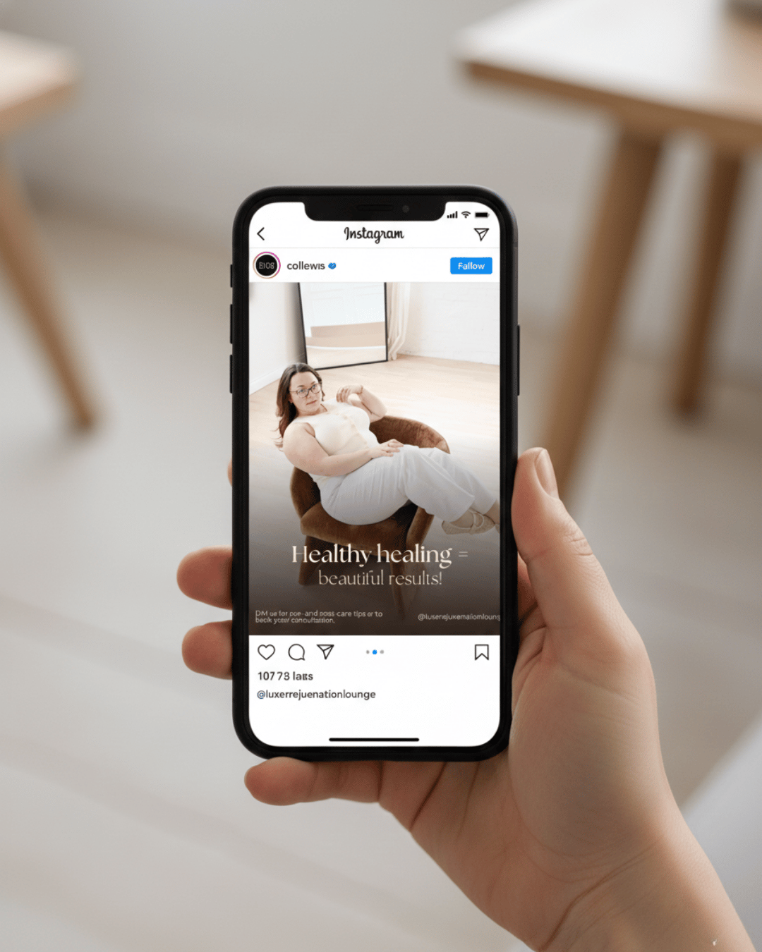 Hand holding a smartphone showing a healthy healing skincare post on Instagram.