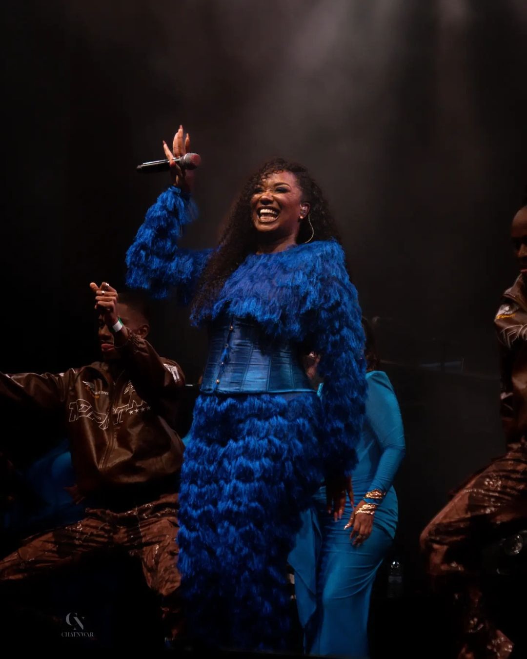 Fanny J singer it's a woman in a blue dress made to measure by Anais Ricard