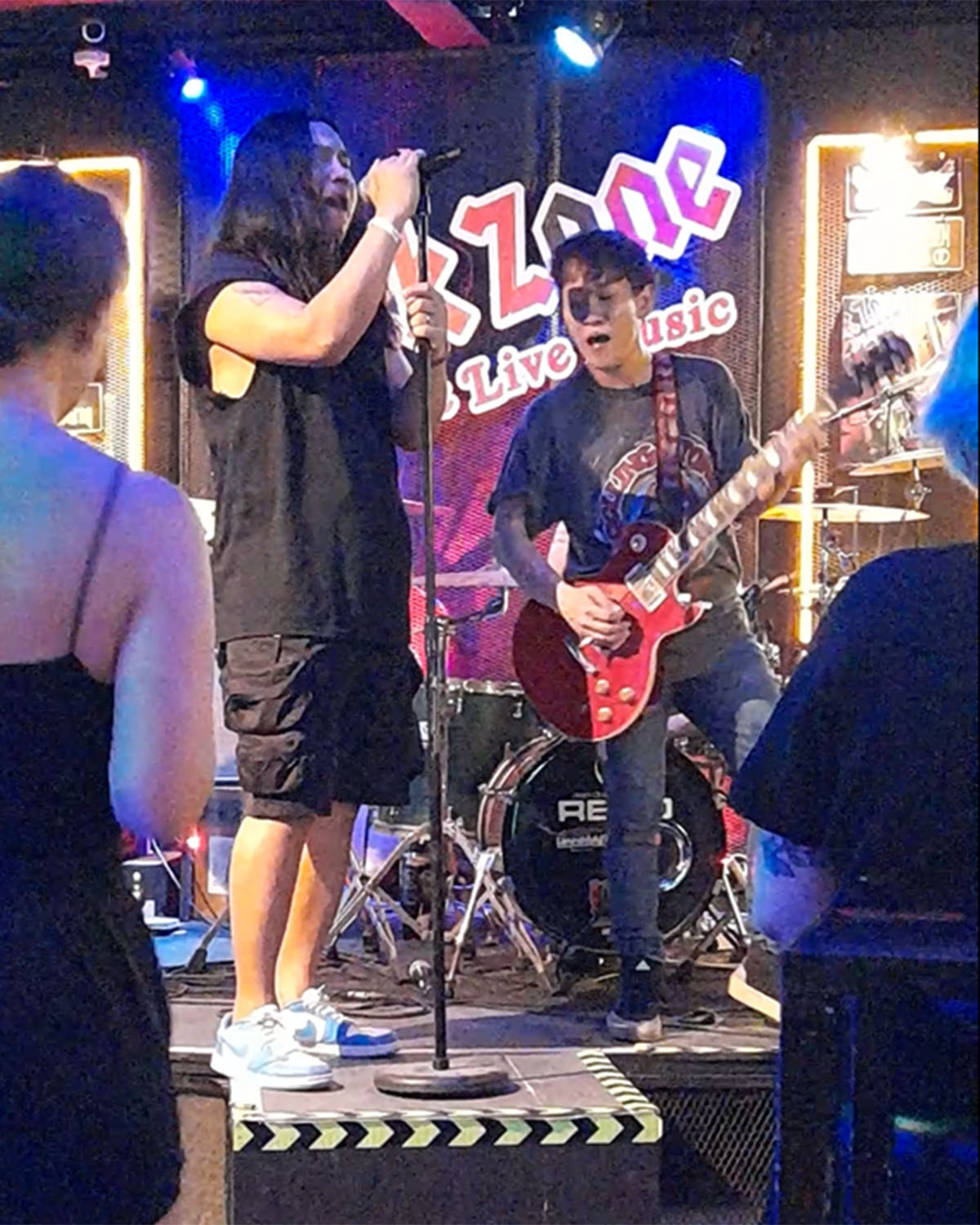 Singer and guitarist on stage at Rock Zone Bar near Soi 94, Hua Hin