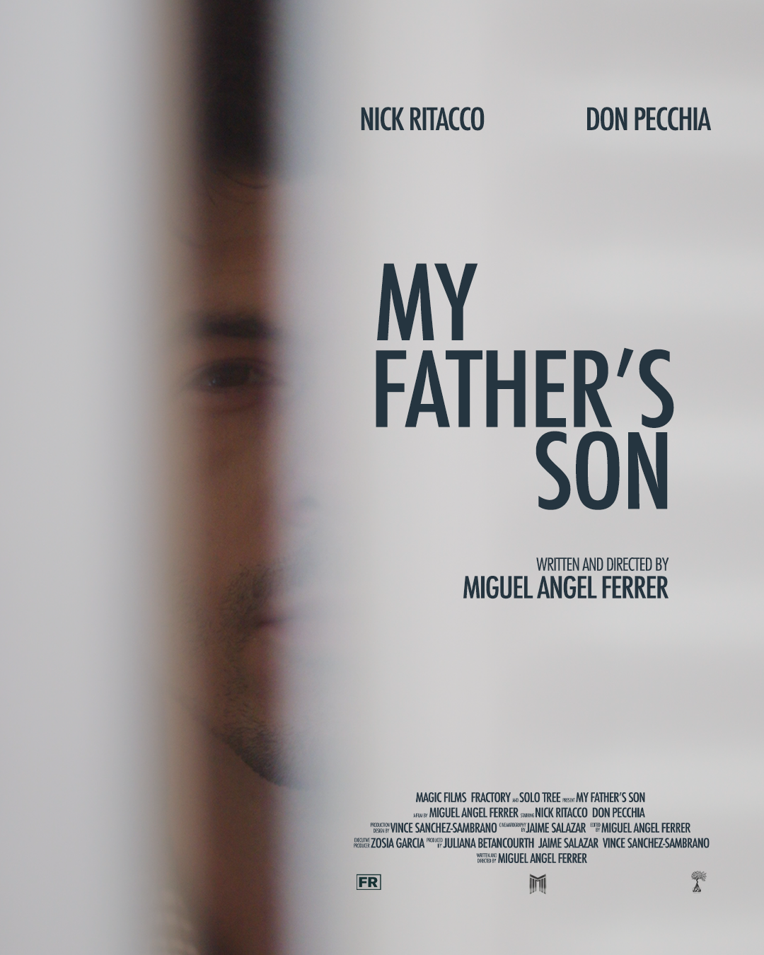 Official movie poster for My Father's Son, featuring a man's face partially obscured by a white foreground.