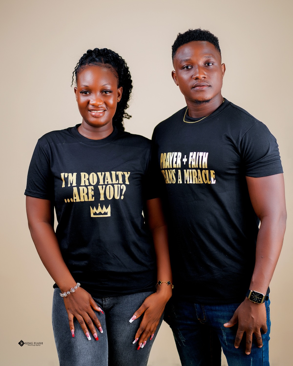 2 models wearing the same T-shirt with different faith wordings.