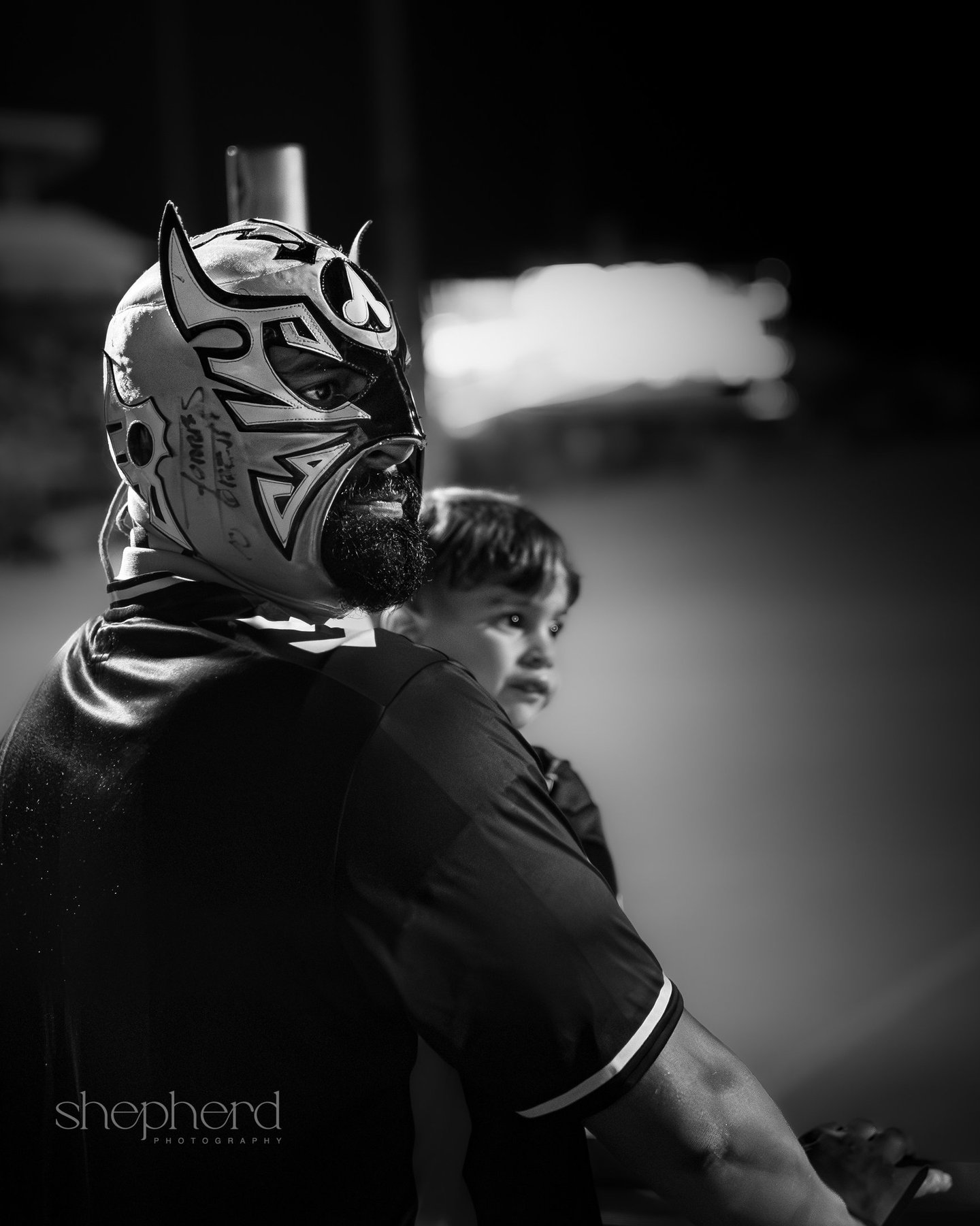 The wrestler in black and white