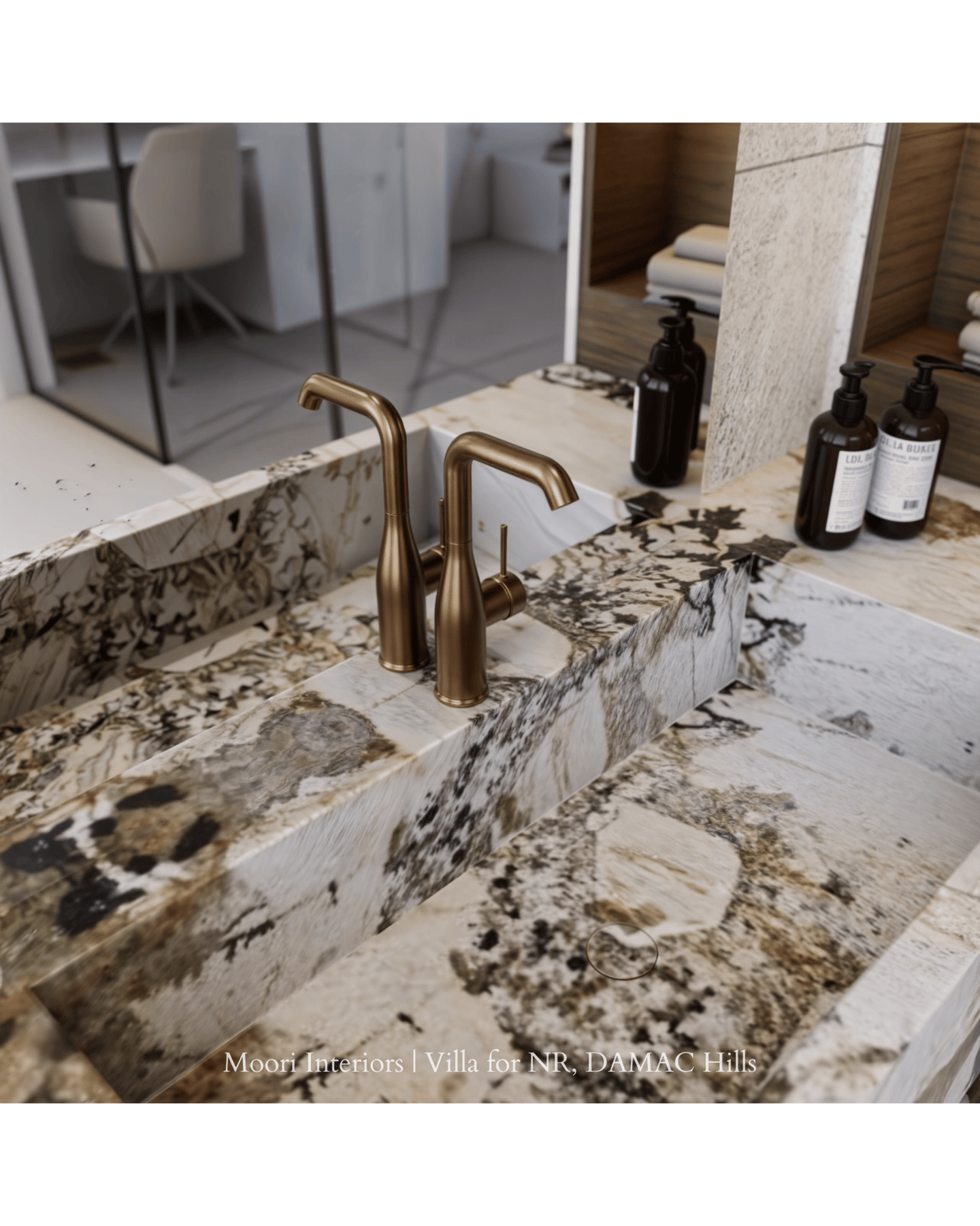 Elegant bathroom sink area showcasing a brass faucet and a distinctive marble countertop.