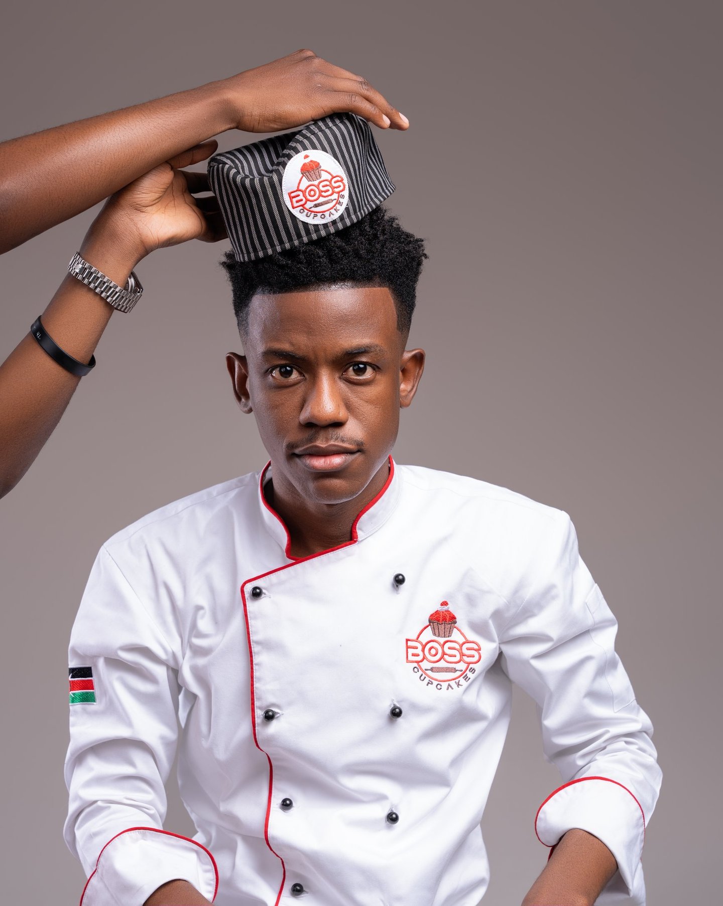 a man in a chef's hat with a chef hat on