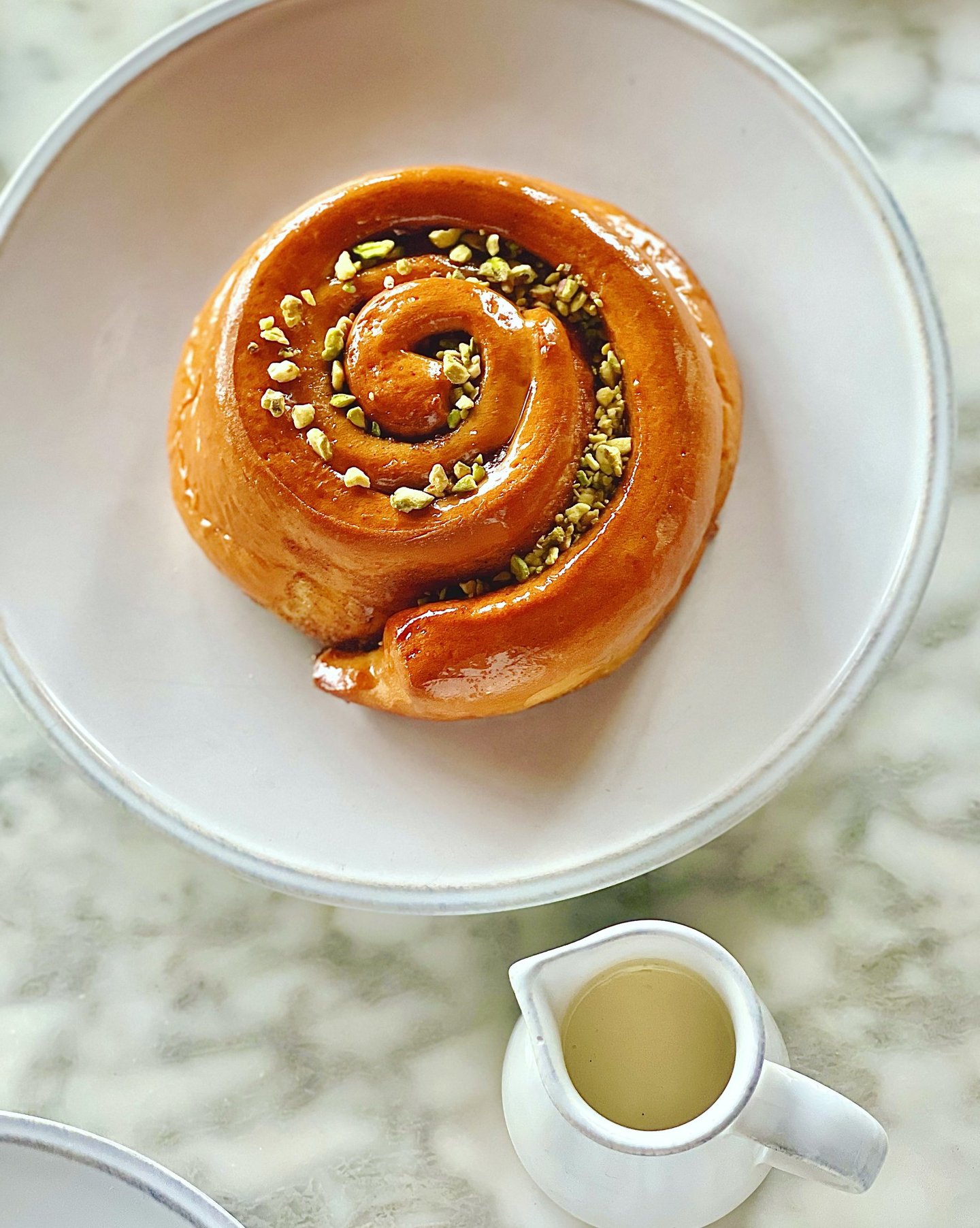 family size cinnamon bun with pistachios 