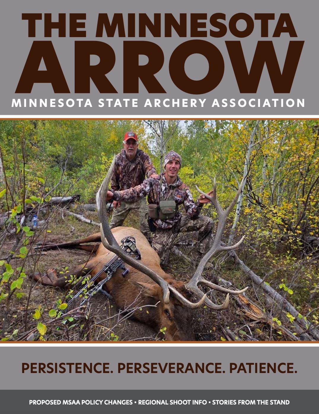 Bo Holand and his father posing with his harvested elk
