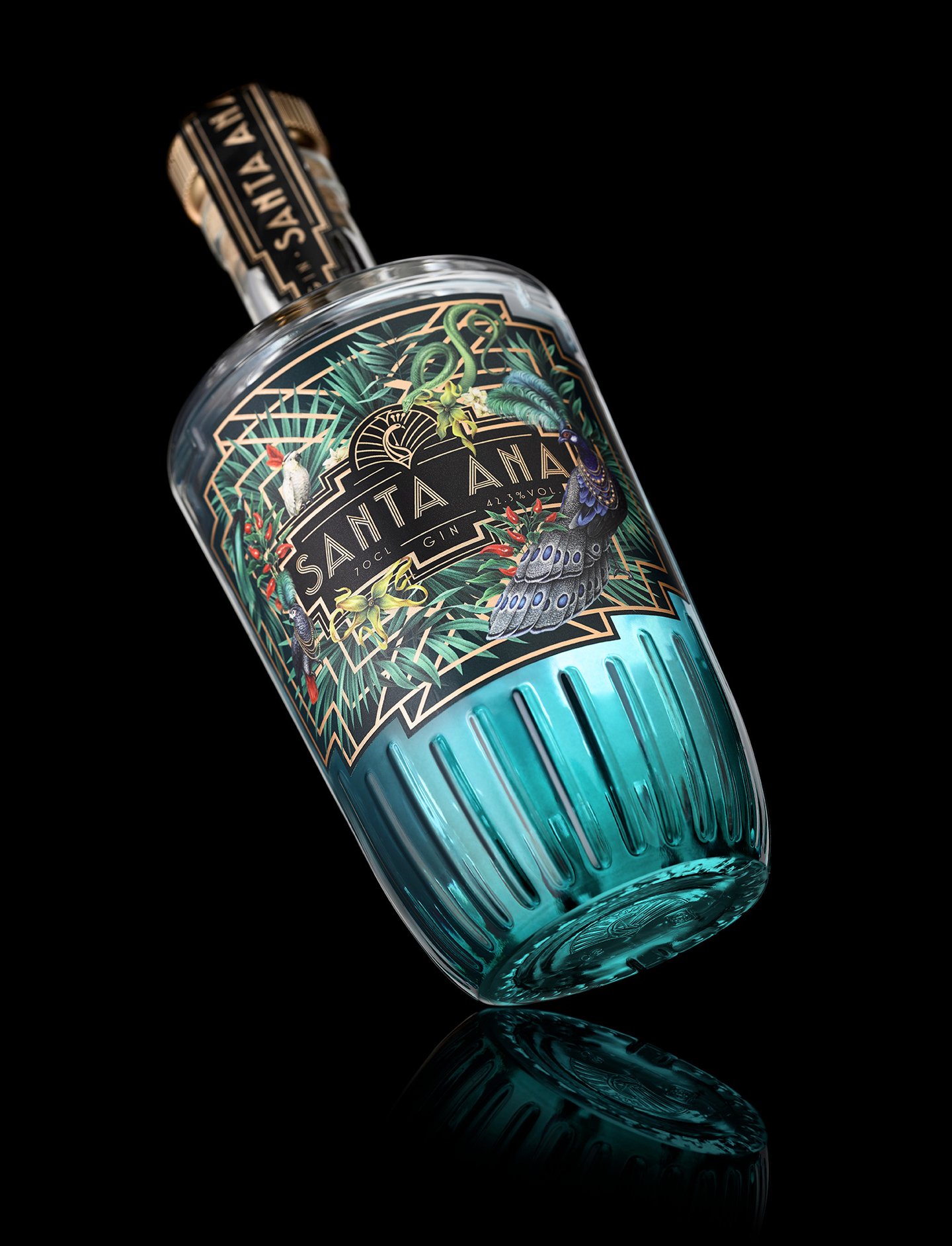 Turquoise gin bottle leaning back at an angle with reflection on a black background