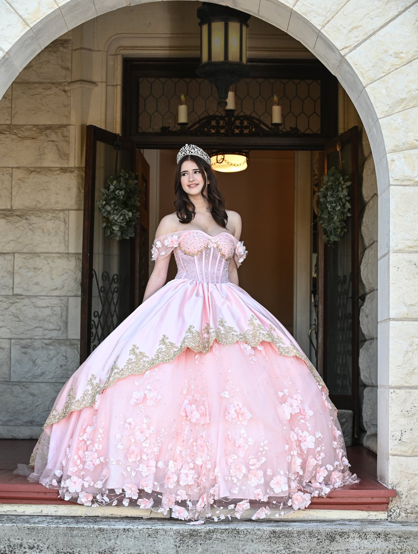 a teenage girl in a beautiful Custom Designed Pink  ball gown.
