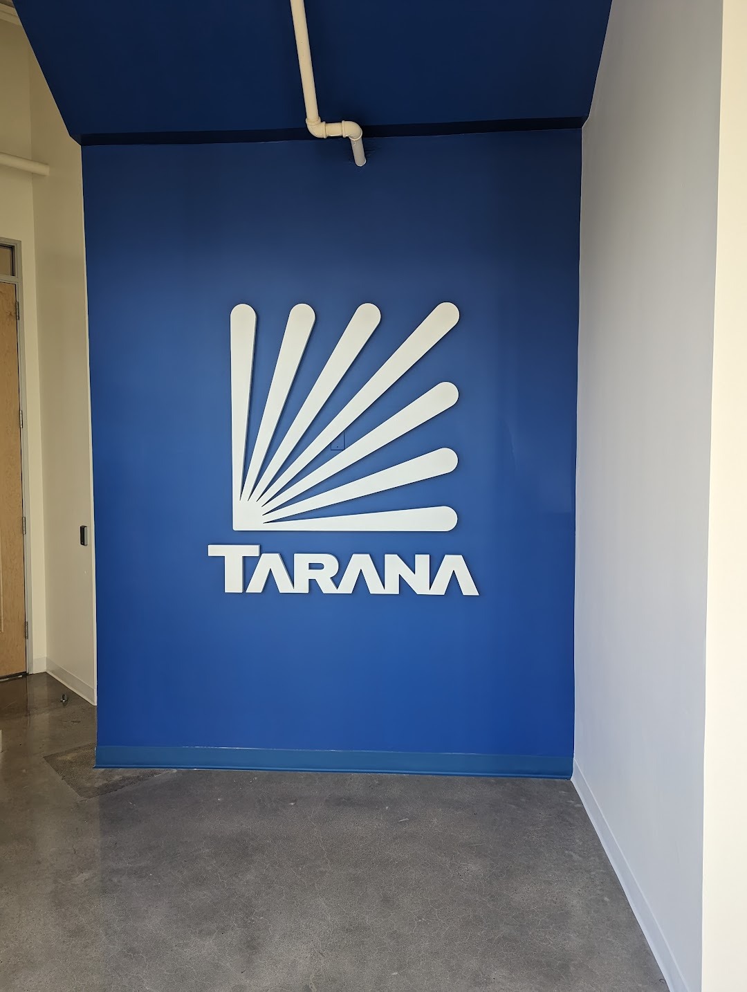 Custom illuminated lobby signage for Tarana office in Milpitas, CA
