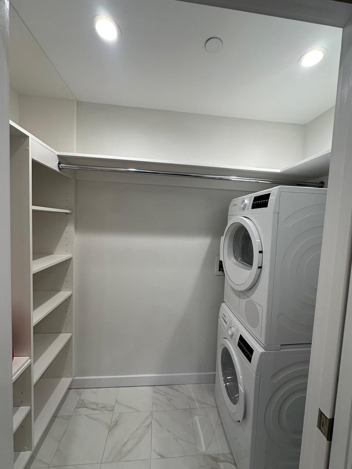 a laundry room with a washer and dryer