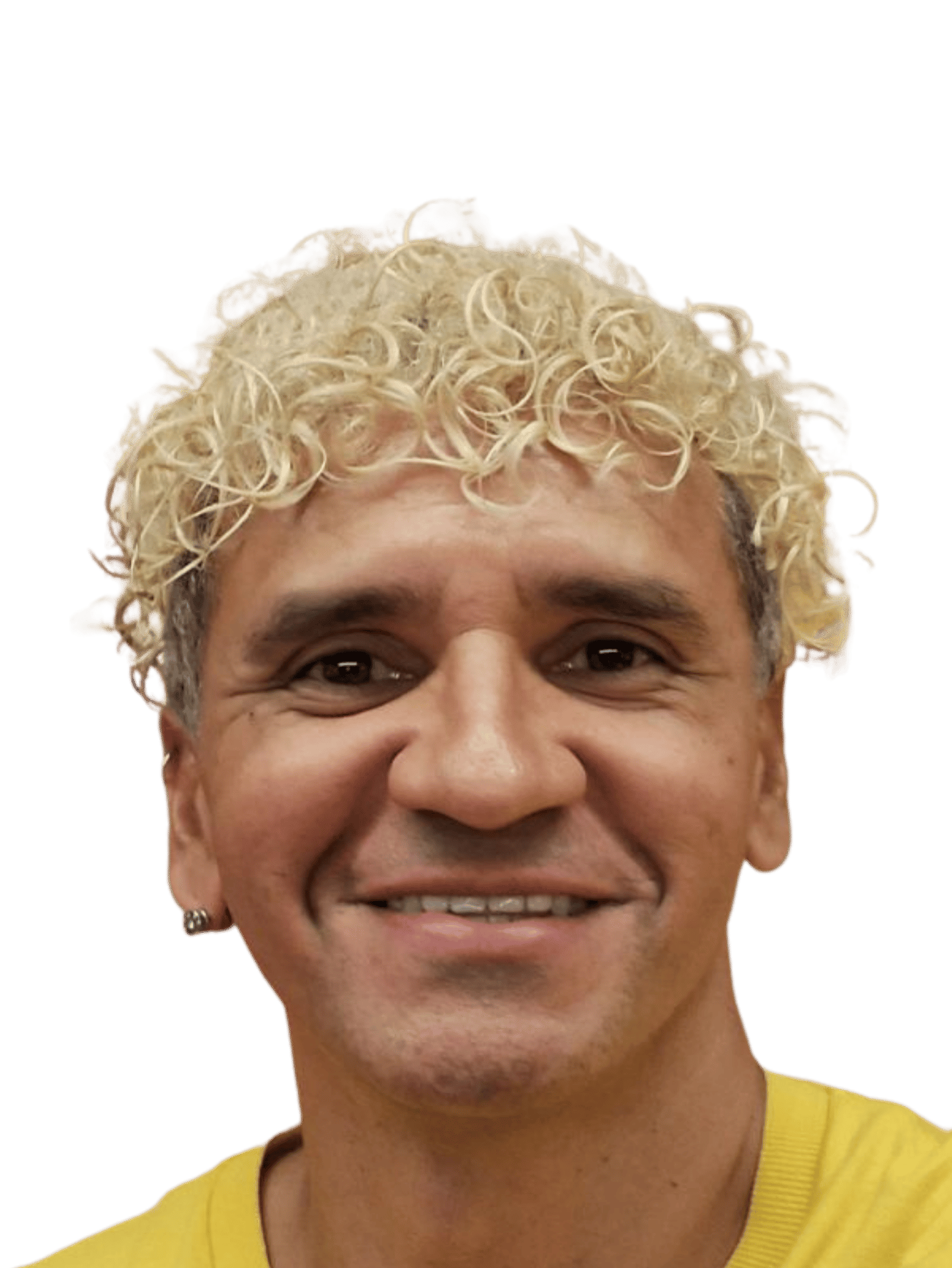 Smiling man with short blonde curly hair and a yellow shirt against a black background.