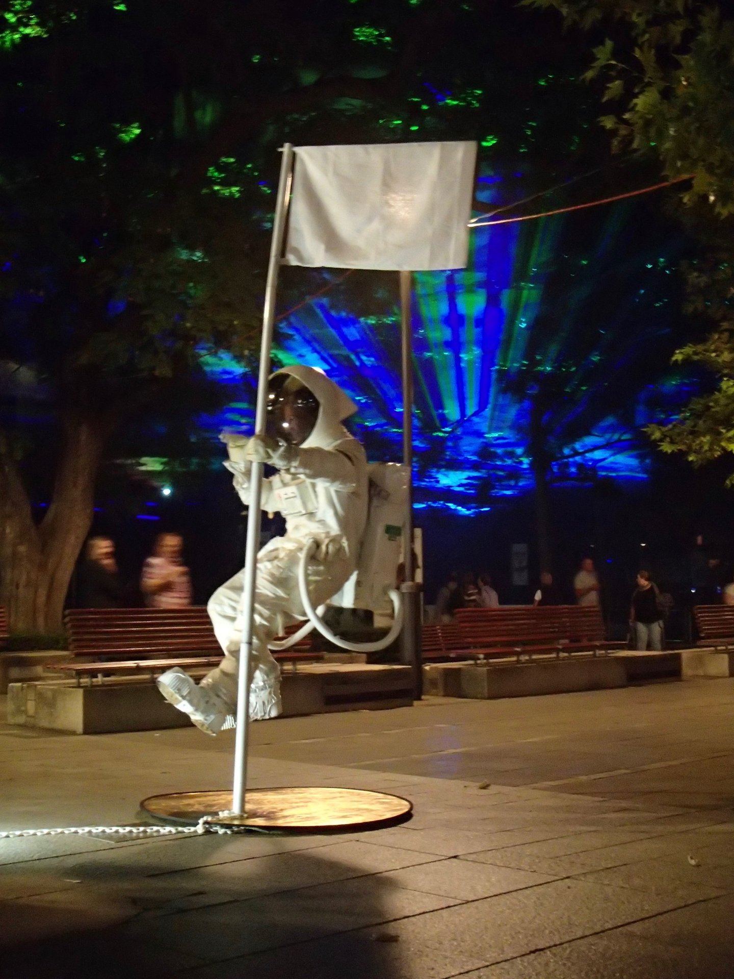 a floating statue illusion of an astronaut in a white suit
