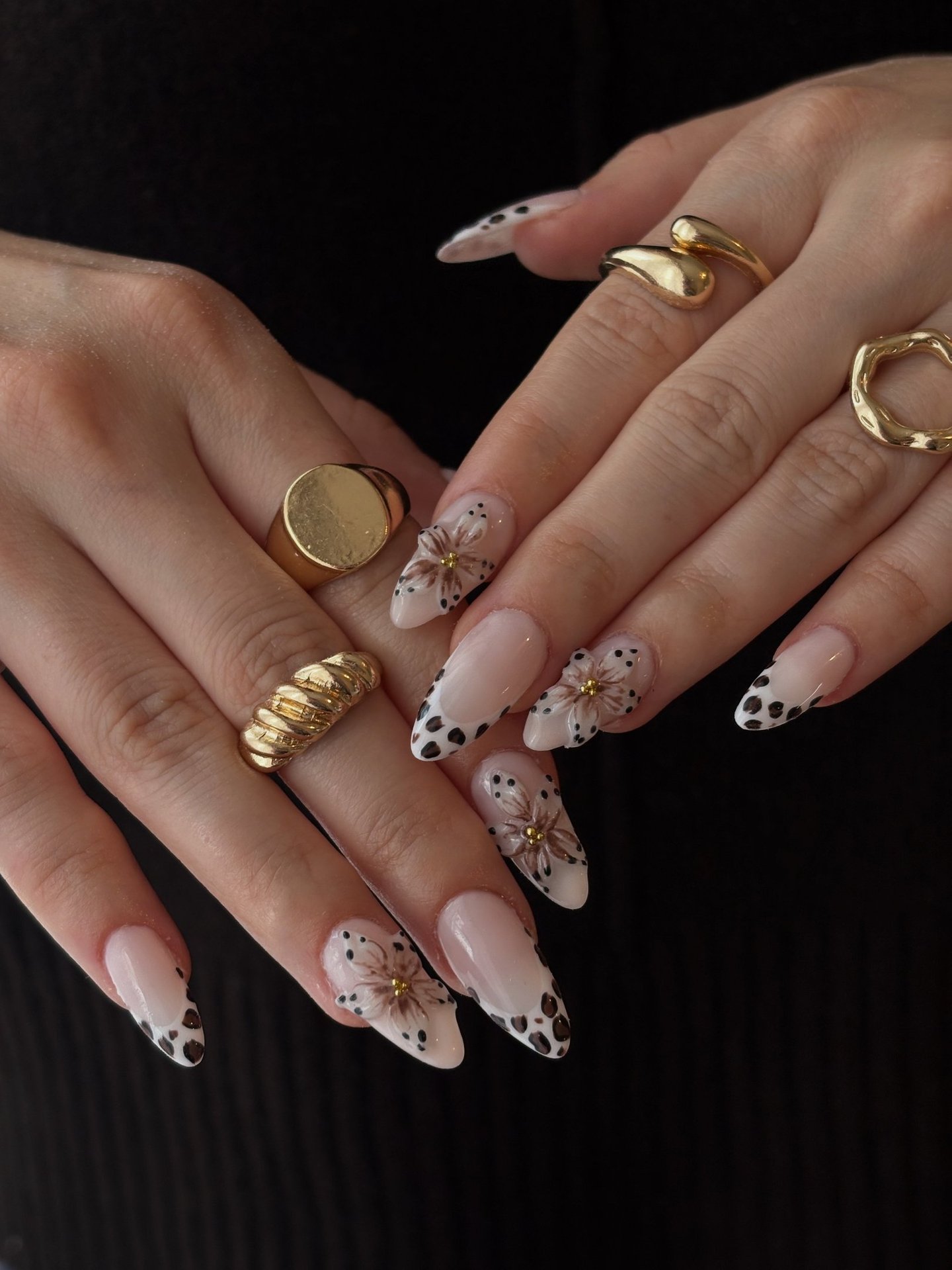 a woman's hands with a manicured manicured manicured manicured mani