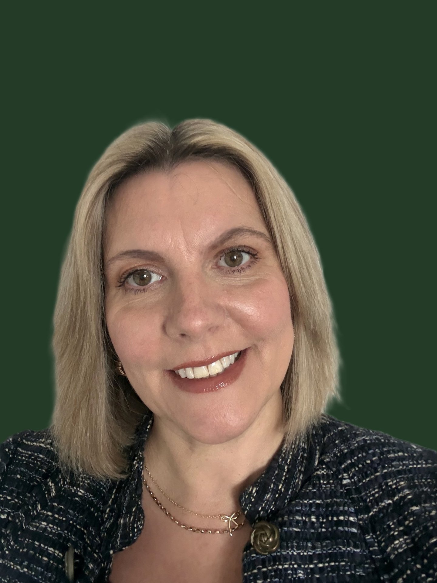 Photograph of Shore Safeguarding Founder Julie Shore, smiling, open, kind expression.