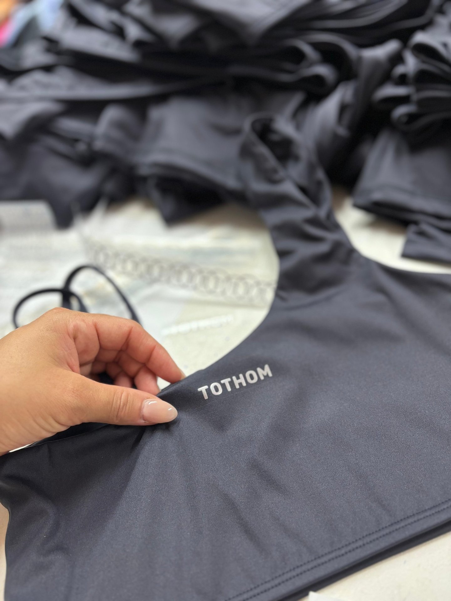 a bikini top with a triangle shaped braille and a brown bra