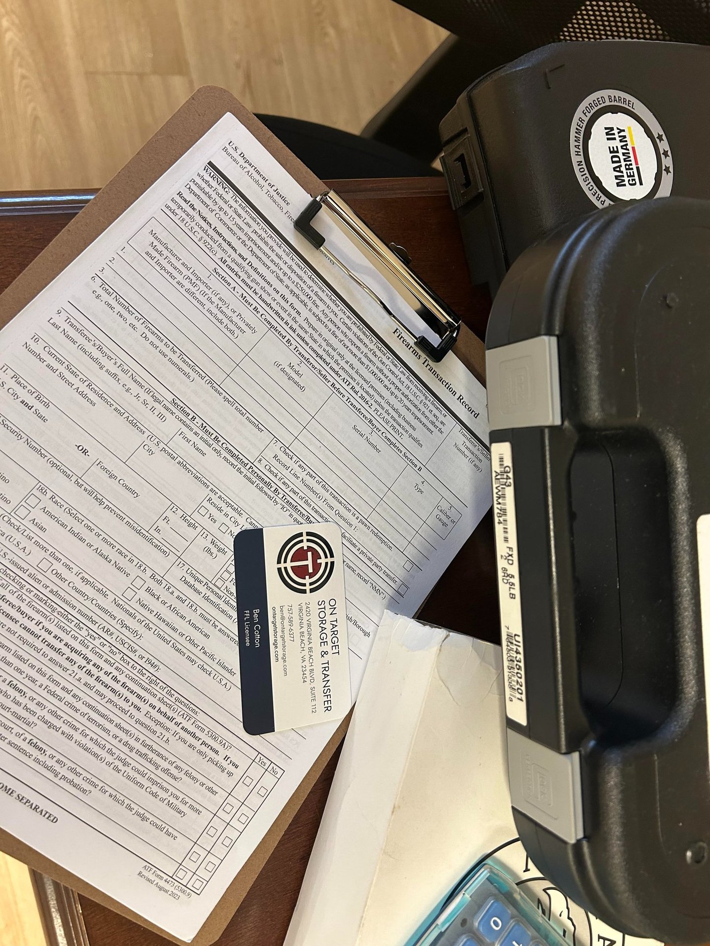 a suitcase with a cell phone and a cell phone